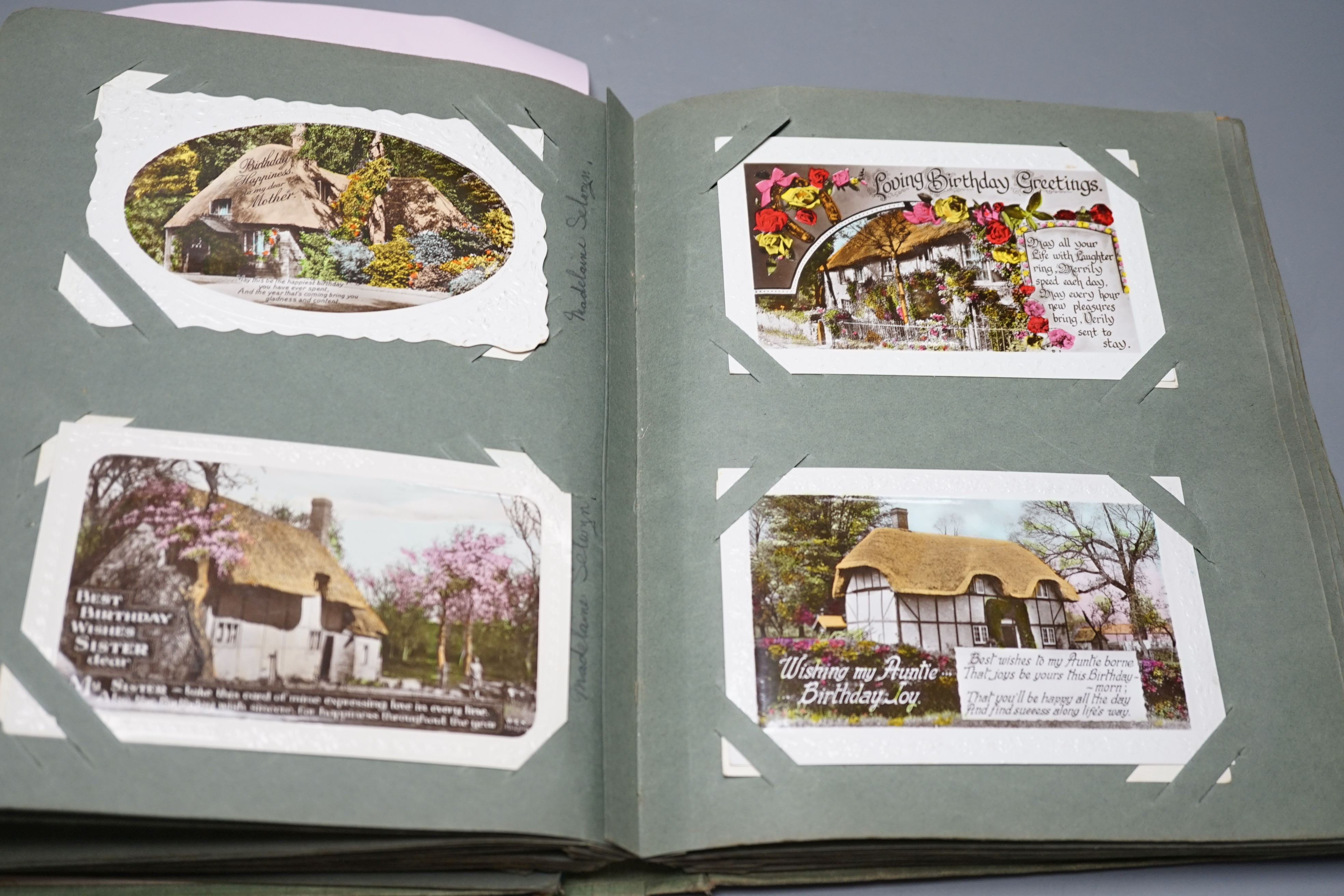 Two postcard album and contents